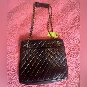 Authentic Vintage Chanel,material:Lamb Skin,color brown.Comes w/ serial seal.